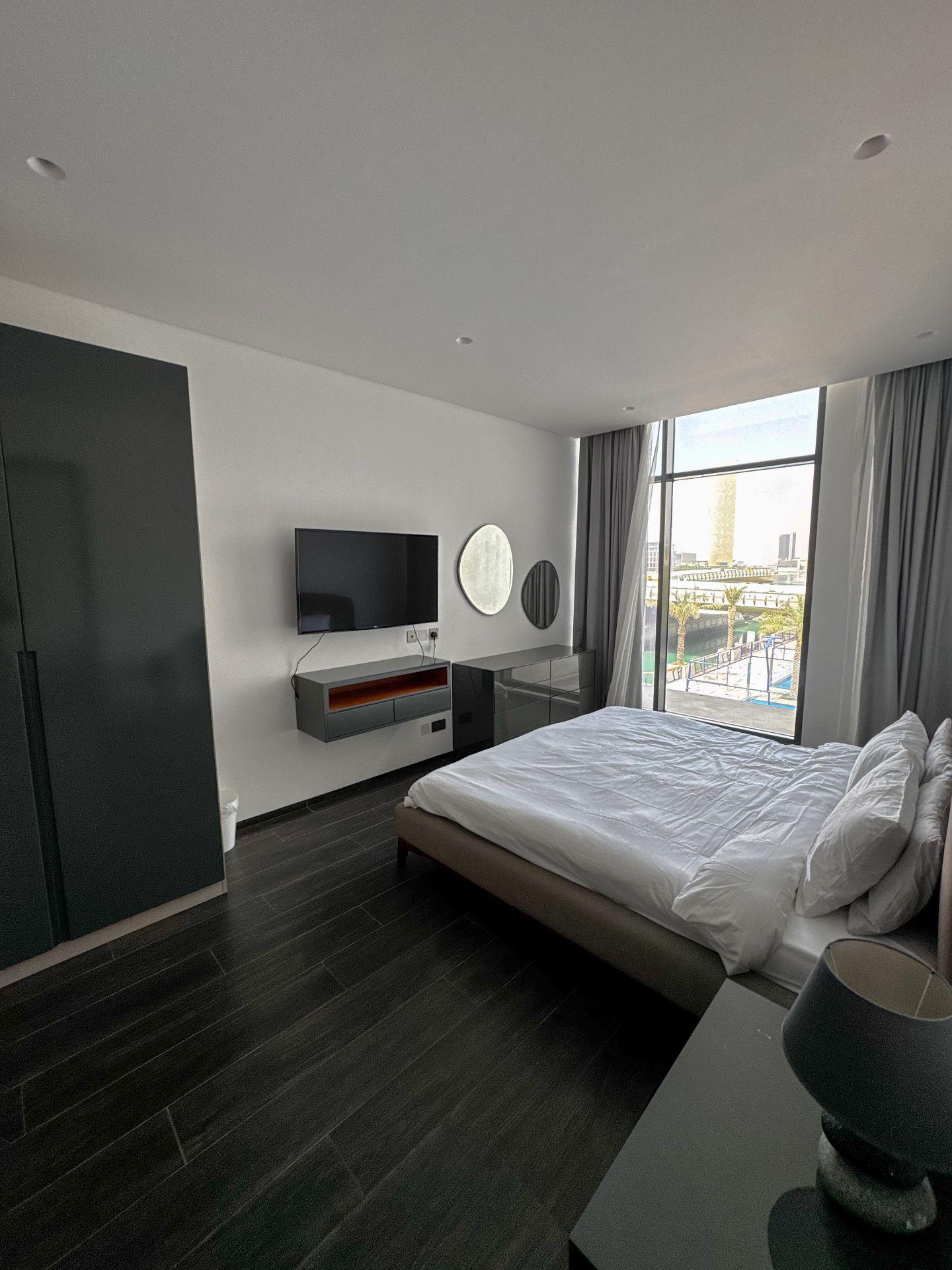 City & Canal View 1BR in Financial Harbour - Image 17